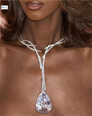A photo of the Millenium Star Pear Diamond Necklace on a woman